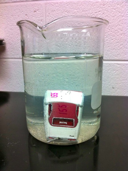 toy car in beaker 1.jpg Toy car in beaker 1